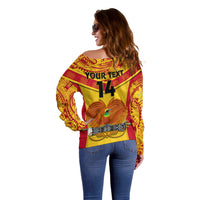 Women’s yellow off-shoulder sweater, side view, back graphic YOURTEXT and number 14