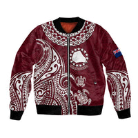 Maroon bomber jacket with white Polynesian turtle graphic, front zip