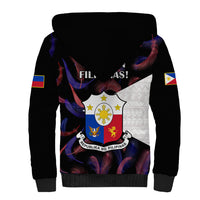 Black sherpa hoodie with white-lined hood and central Filipinas crest graphic.