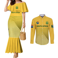 Yellow striped mermaid dress with crest, plus yellow long-sleeve button shirt