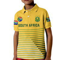 Kids yellow soccer polo shirt with South Africa print, crest, and green striped design
