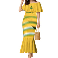Yellow off-shoulder mermaid soccer dress with green stripe bands and South Africa logo
