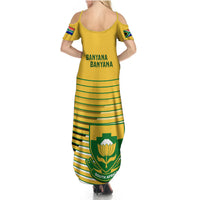 Women's yellow off-shoulder maxi dress with green stripes, Banyana Banyana back print and crest