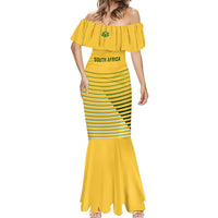 Yellow off-shoulder soccer dress with green horizontal stripes and fishtail flared skirt