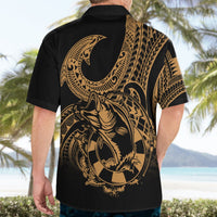 Black Hawaiian-style shirt with gold back-panel tribal waves and fish hook graphic.