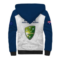 Unisex sherpa hoodie with dark blue hood and sleeves, white front shield graphic