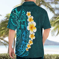 Turquoise Hawaiian shirt back with large plumeria flower garland and tribal tiki design