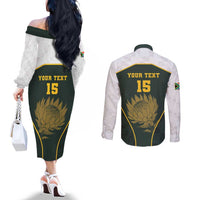 South Africa Rugby Personalised Couples Matching Off The Shoulder Long Sleeve Dress and Long Sleeve Button Shirt Springboks Mascot With King Protea - African Pattern