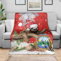 Christmas Costa Rica Blanket A Cheerful Sloth Wearing a Santa Hat