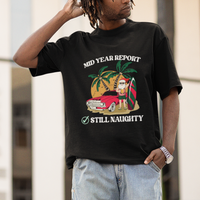 Men's black T-shirt on model, 'Mid Year Report' 'Still Naughty' Santa beach graphic
