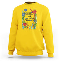Never Underestimate an Old Lady Who Votes Sweatshirt Feminist Gift for Women - Wonder Print Shop