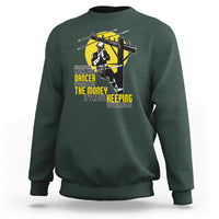 Dark forest green crewneck sweatshirt with yellow pole dancer graphic on the front.