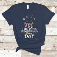 Navy T-shirt with colorful feather arrow graphic and “Columbus Indigenous People’s Day” text