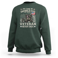 Dark forest green sweatshirt with Veteran Never Ends graphic on front
