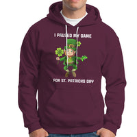 Maroon St. Patrick's Day hoodie with leprechaun graphic and 'I PAUSED MY GAME' text.