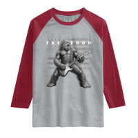 Freedom Bigfoot Playing Electric Guitar Raglan Shirt Sasquatch Rock Star American Flag Patriotic Graphic