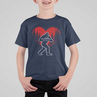 Funny Valentine Bigfoot in Love Heart Hand Sign T Shirt For Kid Romantic Sasquatch in Forest Valentines Day