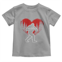 Funny Valentine Bigfoot in Love Heart Hand Sign Toddler T Shirt Romantic Sasquatch in Forest Valentines Day