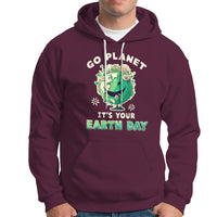 Maroon Earth Day hoodie with front graphic, hood and white drawstrings.
