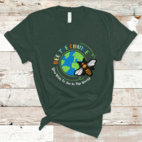 Dark forest green T-shirt with circular bee and globe graphic and slogan