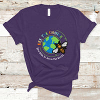 Purple T-shirt with circular bee and globe graphic and slogan