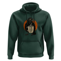 Is He Dead Yet Crow Holding Coffee Cup Hoodie Funny Dark Humor Political Satire