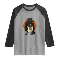 Is He Dead Yet Crow Holding Coffee Cup Raglan Shirt Funny Dark Humor Political Satire