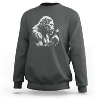 Bigfoot Blowing Dandelion Flower Graphic Sweatshirt Whimsical Sasquatch Profile Artistic Vintage Distressed