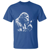 Bigfoot Blowing Dandelion Flower Graphic T Shirt Whimsical Sasquatch Profile Artistic Vintage Distressed
