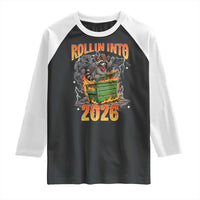 Dumpster Fire Raccoon Meme for Surviving 2025 Raglan Shirt Rollin Into 2026 Trash Panda Energy - Wonder Print Shop
