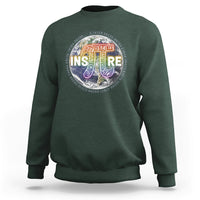 Forest green crewneck sweatshirt with colorful math symbol graphic on chest