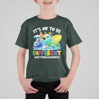 Kids autism awareness T-shirt, dark forest green, front whale graphic with “It’s OK to be Different”