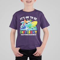 Kids autism awareness T-shirt, purple, front whale graphic with “It’s OK to be Different”
