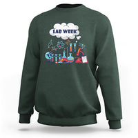 Dark forest green lab-themed sweatshirt with 'LAB WEEK' science beaker graphic