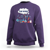 Purple lab-themed sweatshirt with 'LAB WEEK' science beaker graphic