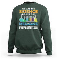 Dark forest green medical lab tech sweatshirt with colorful science and medicine graphic