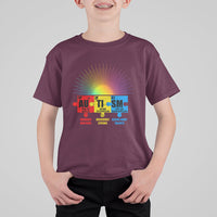 Kids maroon crew-neck T-shirt with colorful rainbow burst and element puzzle graphic