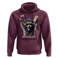 Funny America Raccoon Happy 4th of July Hoodie Holding Hotdog and US Flag Patriotic Graphic