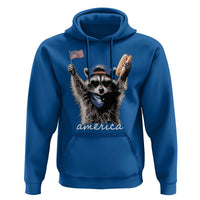 Funny America Raccoon Happy 4th of July Hoodie Holding Hotdog and US Flag Patriotic Graphic