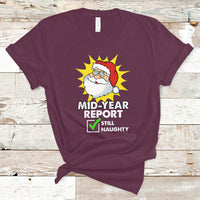 Maroon Christmas-themed graphic t-shirt with Santa “Mid-Year Report” text and checkmark