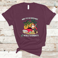 Men's maroon graphic T-shirt, 'Mid Year Report' 'Still Naughty' Santa beach print