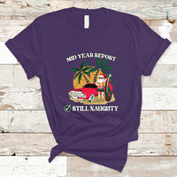 Men's purple graphic T-shirt, 'Mid Year Report' 'Still Naughty' Santa beach print