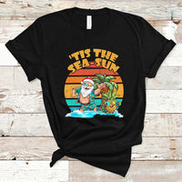Black crewneck graphic T-shirt with Santa in tropical beach scene print