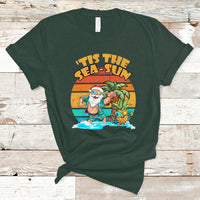 Dark forest green crewneck graphic T-shirt with Santa in tropical beach scene print