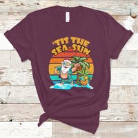 Maroon crewneck graphic T-shirt with Santa in tropical beach scene print