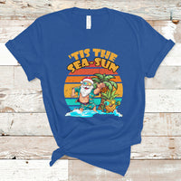 Royal blue crewneck graphic T-shirt with Santa in tropical beach scene print