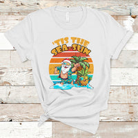 White crewneck graphic T-shirt with Santa in tropical beach scene print
