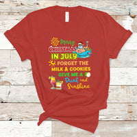 Red crew-neck T-shirt with colorful Christmas in July graphic and Santa