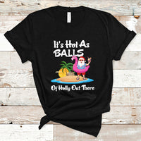 Black novelty Christmas in July T-shirt with cartoon Santa, palm trees, and text graphic