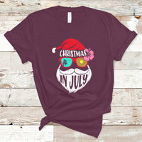 Maroon short-sleeve T-shirt with Christmas in July Santa face graphic